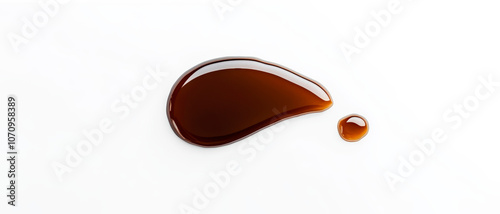 Two dark brown liquid drops in different sizes appear on a white background, showing glossy surfaces that reflect light. Spilled soy sauce puddle. Generative AI