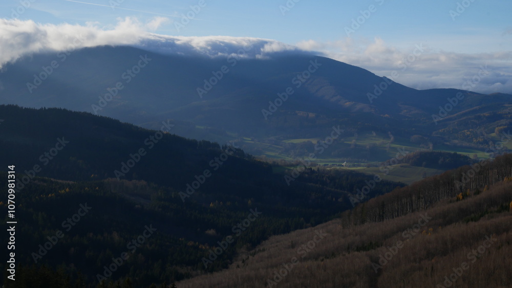 Scenic autumn landscape with clouds rolling over a mountain range of Jeseniky mountains, Czech Republic Scenic autumn landscape with clouds rolling over a mountain range of Jeseniky mountains, Czech Republic