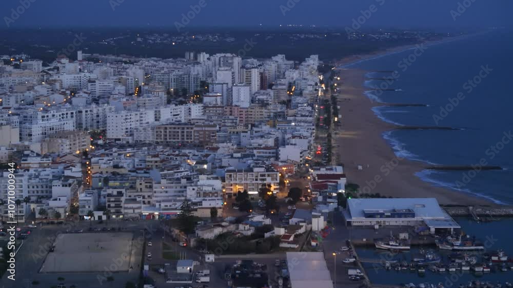 Aerial View City and Beach of Quarteira, Algarve, Portugal at night Aerial View City and Beach of Quarteira, Algarve, Portugal at night