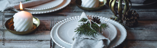 Banner. Elegant decor for Christmas family dinner. Center piece with burning candles, vintage chandelier. Zero waste eco-friendly home decoration, fir tree branches. Cozy atmosphere, wooden furniture