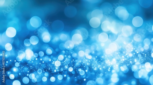 A mesmerizing abstract background featuring various shades of blue with sparkling bokeh effects.