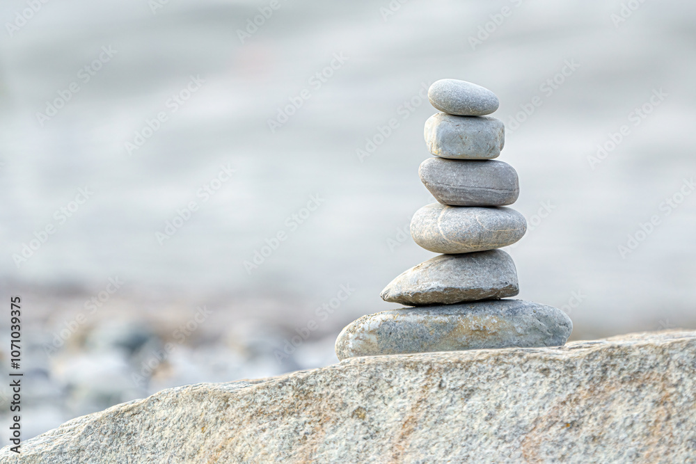 Balancing zen stones on top of each other in the background Balancing zen stones on top of each other in the background