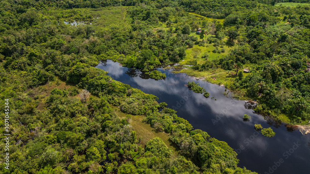 The Nanay River, one of the most important freshwater channels in the Peruvian jungle surrounded by green nature, and is part of the Allpahuayo Mishana Reserve The Nanay River, one of the most important freshwater channels in the Peruvian jungle surrounded by green nature, and is part of the Allpahuayo Mishana Reserve