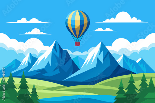 A hot air ballon on a blue sky over a beautiful mountain landscape