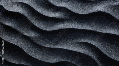 dramatic black sand texture with subtle ripples and shadows highresolution abstract photo