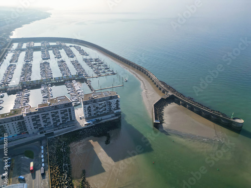 Aerial View of British Tourist Attraction of Beach and Ocean at Brighton and Hove Coastal City of England United Kingdom. High angle Footage of British Tourist Attraction Was Captured on May 9th, 2024