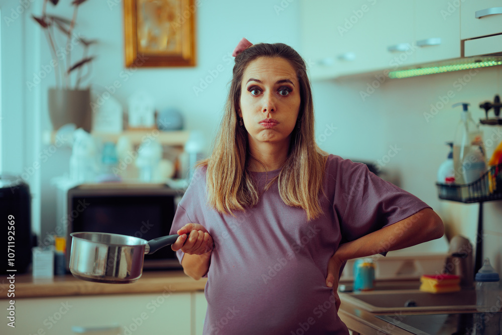 Tired Mother to be Busy Cooking in the Kitchen. Stressed mother to be feeling exhausted and stressed out
Tired Mother to be Busy Cooking in the Kitchen. Stressed mother to be feeling exhausted and stressed out