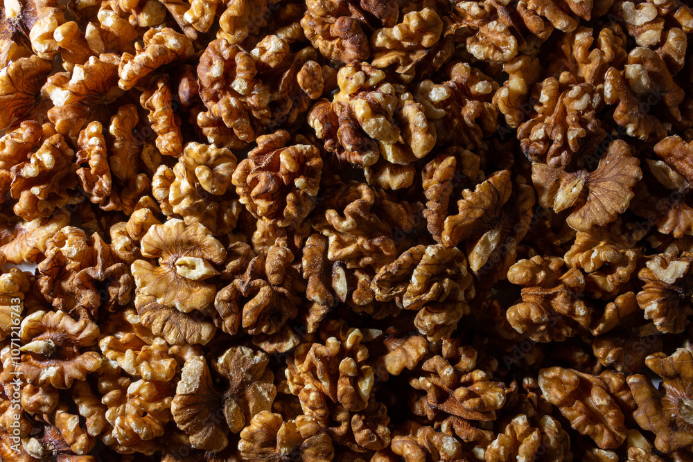 Scattered Shelled Walnuts. Background from Walnut. Natural High-Calorie Snacks