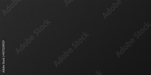 Close-up shot of a textured black paper sheet, design, texture