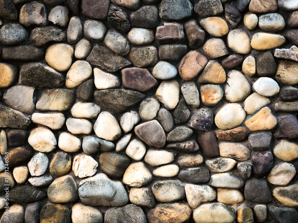 Background of masonry round stones on the surface Background of masonry round stones on the surface