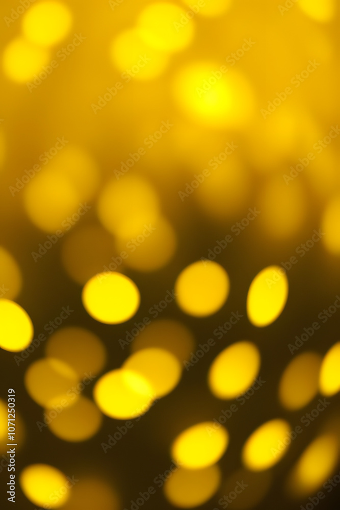Obraz premium Ethereal Yellow Bokeh Lights Abstract Background