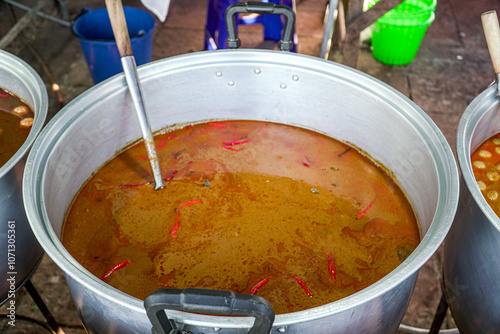 Big pot of curry, Khanom Jeen liquid, Thai food, Tom Yum, pictures for content about Thai food. photo