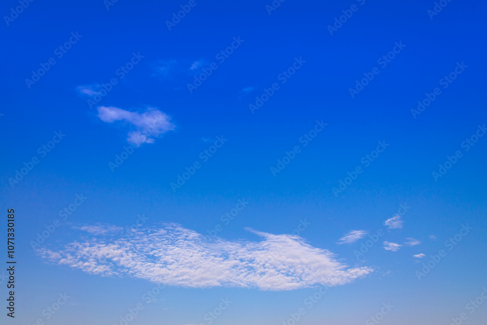 Sunny day with blue sky and white fluffy clouds background and pattern