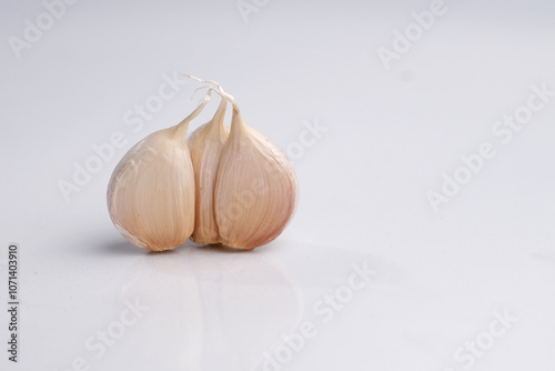 garlic on a white background photo