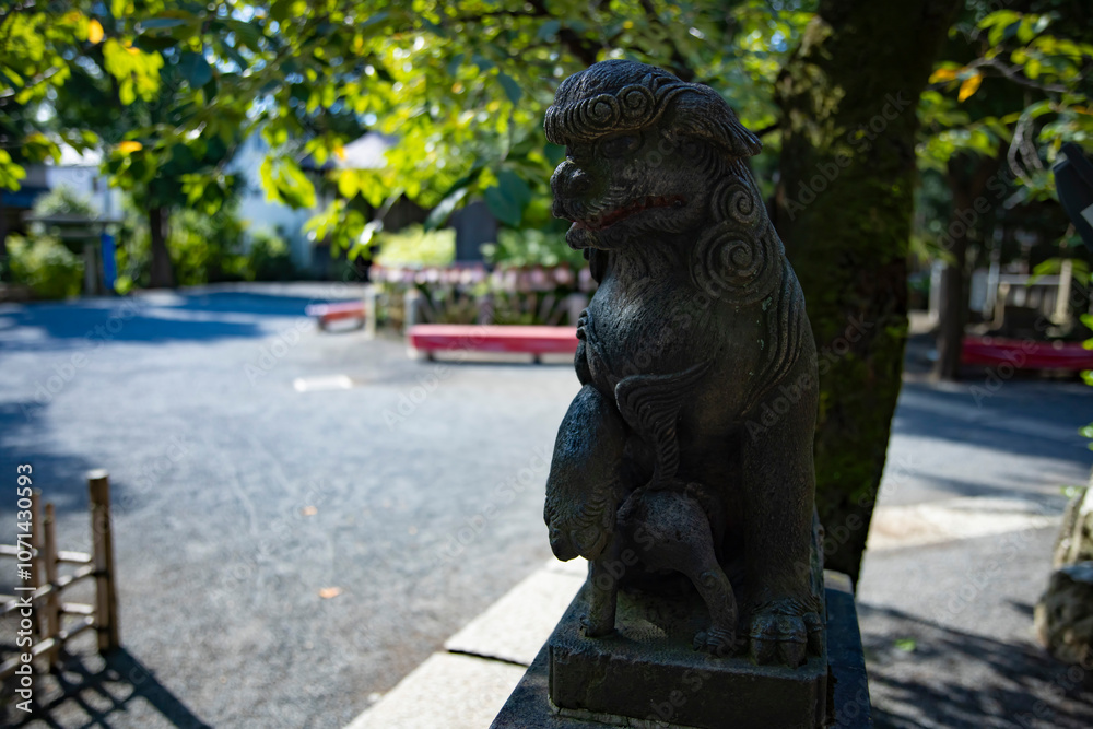 A statue of guardian dog KOMAINU at Nanasha shrine in Tokyo A statue of guardian dog KOMAINU at Nanasha shrine in Tokyo