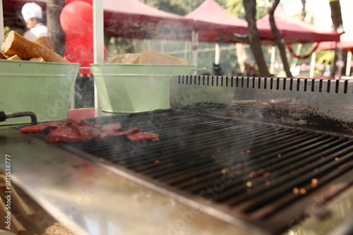 Outdoor Cooking at a Summer Party with Grilled Meat