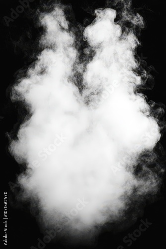 White smoke cloud rising on a black background.