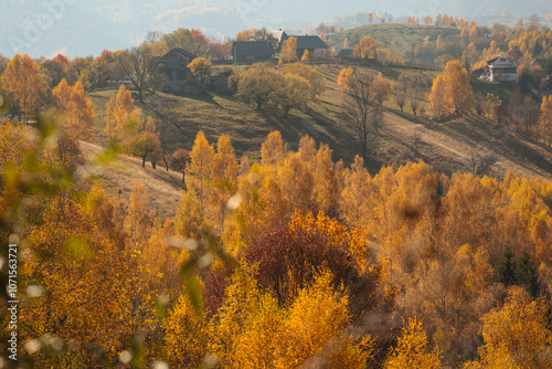 Scenic autumn overview of Magura village in Romania, near the Piatra Craiului mountains photo