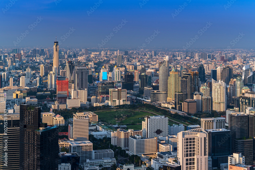 Modern Skyscraper of business center district at Bangkok skyline with blue sky background, Bangkok city is modern metropolis and favorite of tourists of Thailand