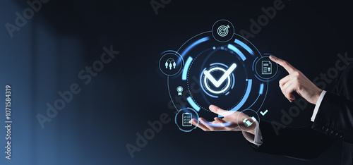 Digital interface with checkmark and icons. Futuristic graphic style on dark background. Concept of quality approval and project management photo