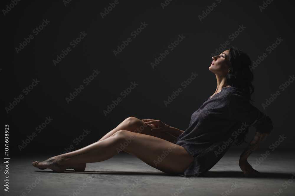 Silhouette of Woman in Thoughtful Pose with Shadows Silhouette of Woman in Thoughtful Pose with Shadows