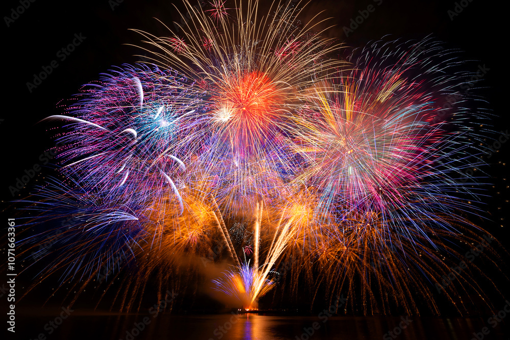 colourful firework display set for celebration happy new year and merry christmas and fireworks on black background