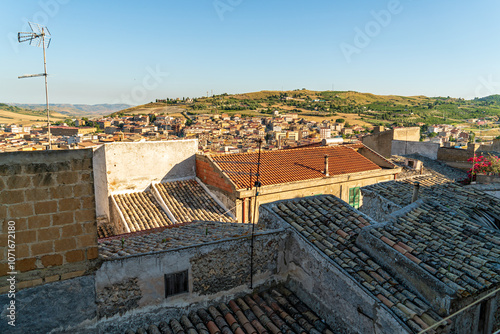 Pietraperzia, Sicily, Italy. Panorama of the city with roofs. Summer sunny day photo