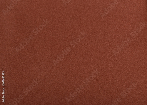 Fototapeta Designer paper background with a rich, velvety matte texture in warm earthy tones like terracotta, ochre, and cinnamon