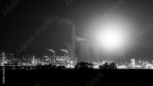 Sasol petrochemical refinery in Secunda, South Africa, at night while the flares burn brightly