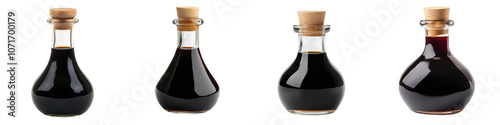 glass bottles filled with premium balsamic vinegar and soy sauce stand elegantly on a rustic wooden table creating a sophisticated still life composition for culinary or kitchen related content photo