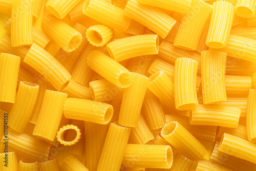 Italian dry pasta rigatoni close-up. Food background. photo