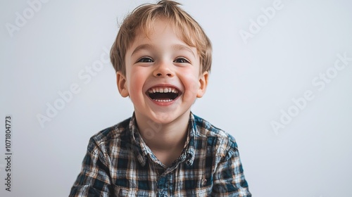 Happy Young Boy Having Fun in a Studio Setting, Isolated on a Clean White Background, Captures Joyful Emotions and Playful Spirit of Childhood