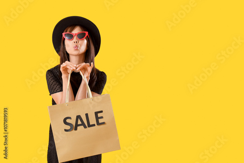 Young Asian woman with shop...