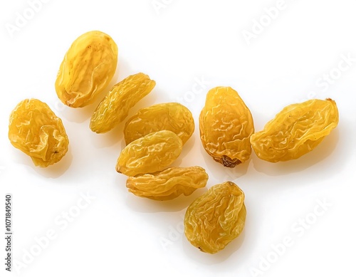 Yellow sultanas raisins on isolated white background