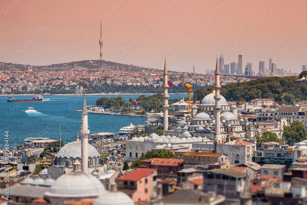 A stunning aerial view of Istanbul, showcasing the Bosphorus and historic mosques with towering minarets.