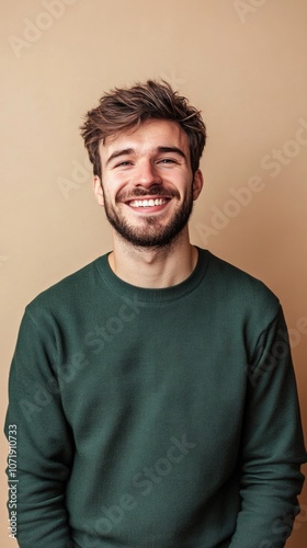 Confident happy young Latin business man standing in office arms in pockets, portrait. Smiling Hispanic businessman manager, successful entrepreneur, male professional executive vertical.