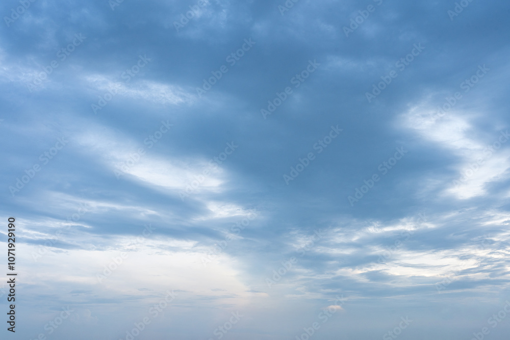 Beautiful fluffy white clouds drift across a clear blue sky Beautiful fluffy white clouds drift across a clear blue sky