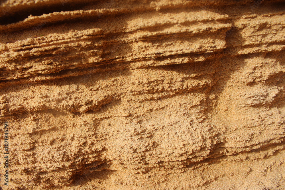 Sandstone or sand close up with ridges in the wall. Kauai Hawaii cliff hike. Version 2 Sandstone or sand close up with ridges in the wall. Kauai Hawaii cliff hike. Version 2