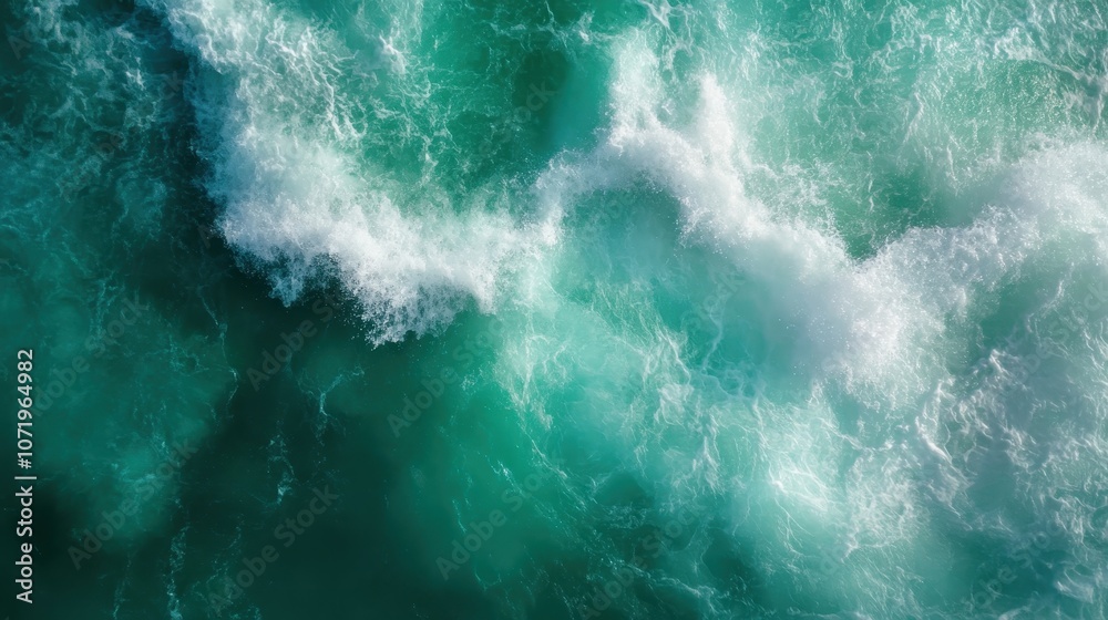 Fototapeta premium A smooth, top-down view of an ocean wave cresting gently, with sunlight reflecting off the turquoise water, capturing a sense of elegance and natural harmony.