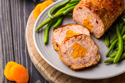 Delicious grilled chicken breast with potatoes, tomatoes, and rosemary
