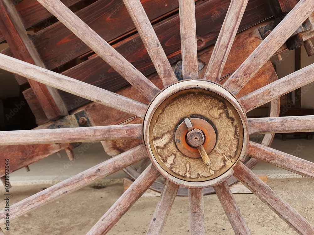 Old wagon wheel. Old wooden wagon wheel of a carriage