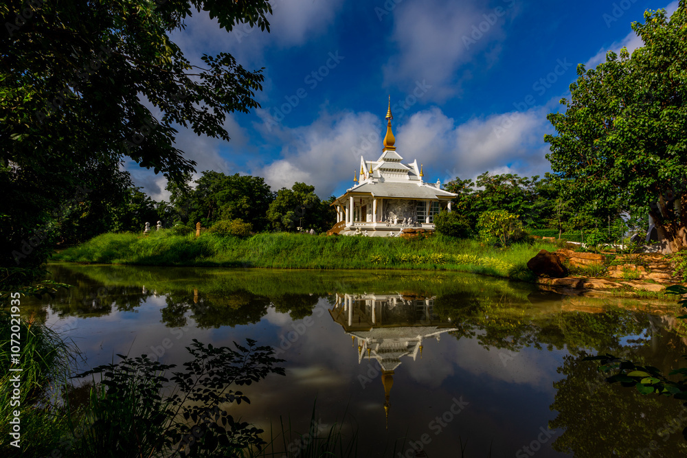 Fototapeta premium The background of an important tourist attraction in Khon Kaen Province (Wat Thung Setthi) is a large pagoda in the middle of a swamp, tourists always come to see the beauty in Thailand