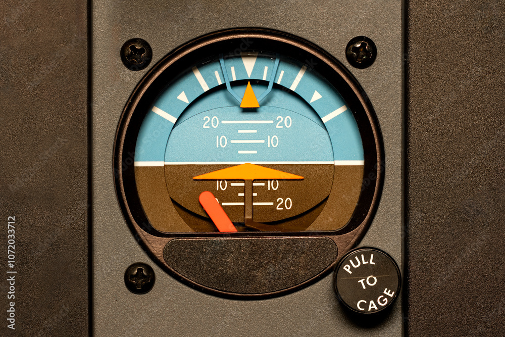 Fototapeta premium Artificial Horizon Aircraft Instrument. Attitude Indicators are used by pilots to determine the orientation of the aircraft in flight. Aviation component in a cockpit flightdeck