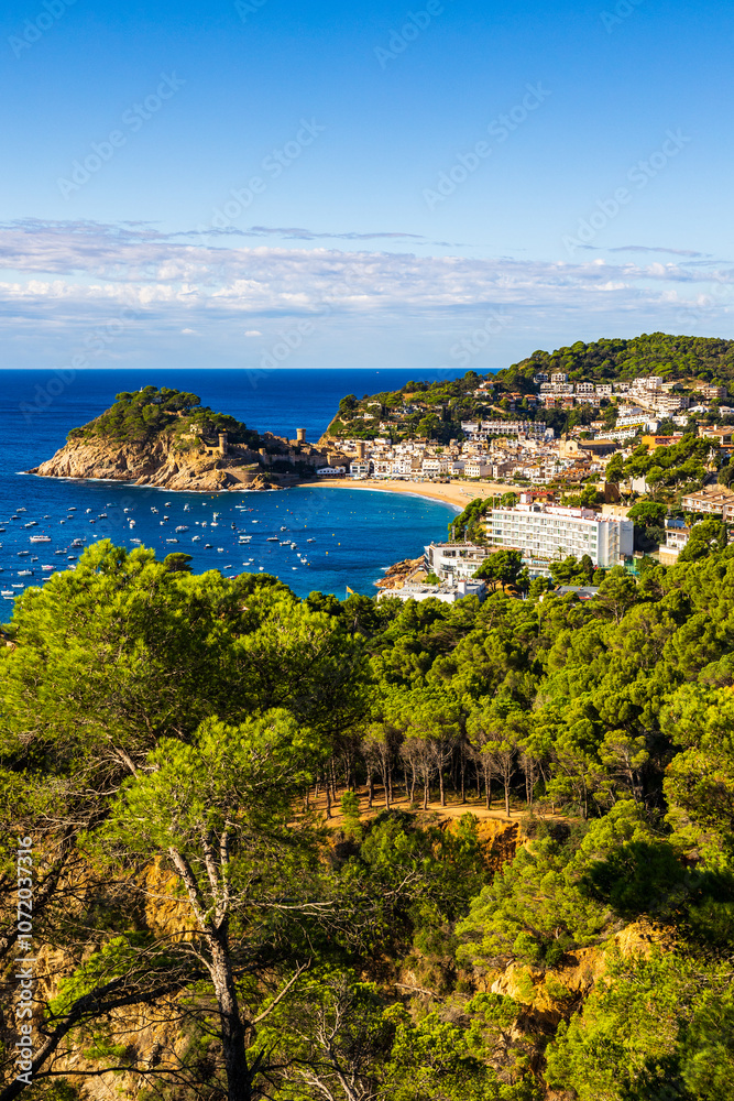 Fototapeta premium Bay of Tossa de Mar with the old town’s fortified walls and white facades