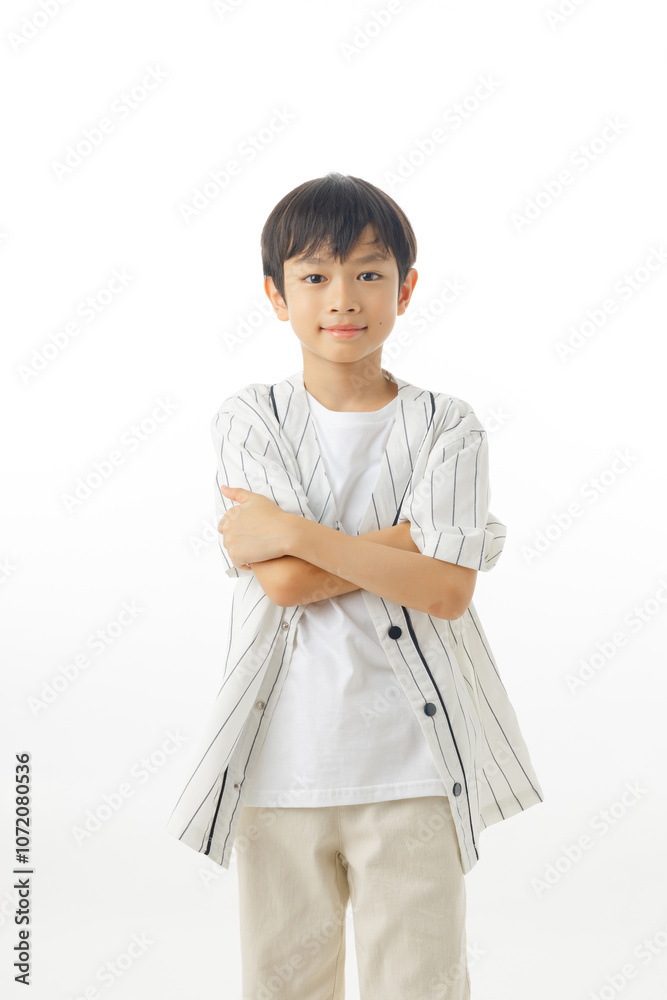 Happy Asian little boy cross arms and confident isolated on white background, Excited kid winner success concept, Looking at camera. Happy Asian little boy cross arms and confident isolated on white background, Excited kid winner success concept, Looking at camera.