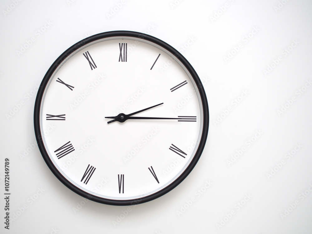 Clock Showing 14.15/02.15 with Roman Numerals – Simple Round Clock for Concepts of Time Management and Scheduling. Clock Showing 14.15/02.15 with Roman Numerals – Simple Round Clock for Concepts of Time Management and Scheduling.