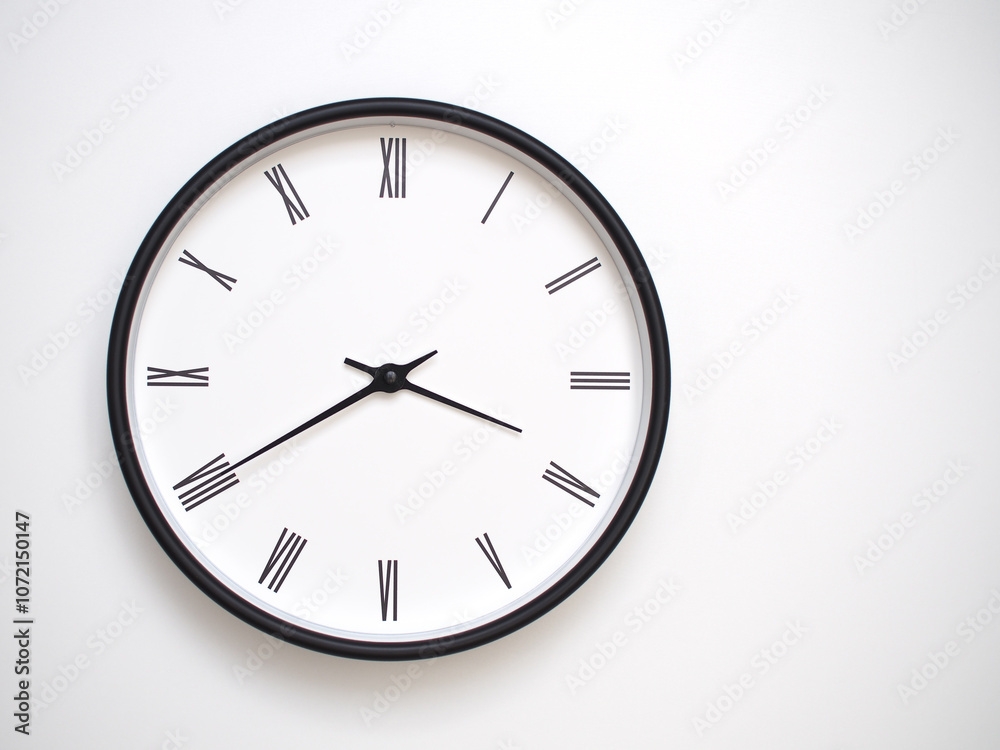 Clock Showing 15.40/03.40 with Roman Numerals – Simple Round Clock for Concepts of Time Management and Scheduling. Clock Showing 15.40/03.40 with Roman Numerals – Simple Round Clock for Concepts of Time Management and Scheduling.