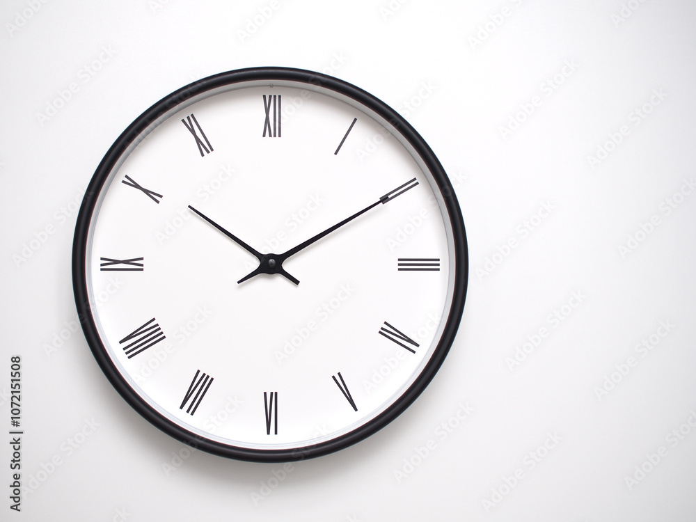Clock Showing 22.10 or 10.10 with Roman Numerals – Simple Round Clock for Concepts of Time Management and Scheduling. Clock Showing 22.10 or 10.10 with Roman Numerals – Simple Round Clock for Concepts of Time Management and Scheduling.
