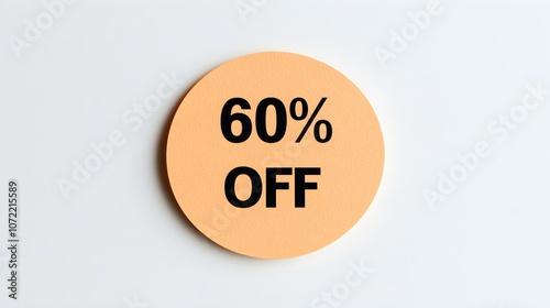 Black '60% OFF' Text on a Light Orange Round Paper Note. White Background with Copy Space