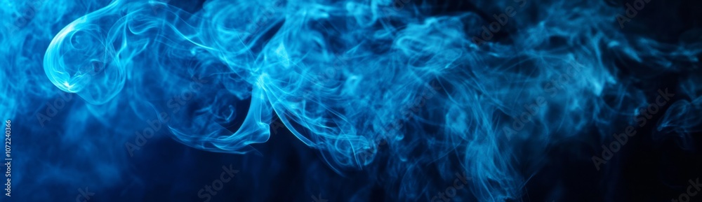 Abstract Blue Smoke Swirling and Flowing on Black Background Abstract Blue Smoke Swirling and Flowing on Black Background